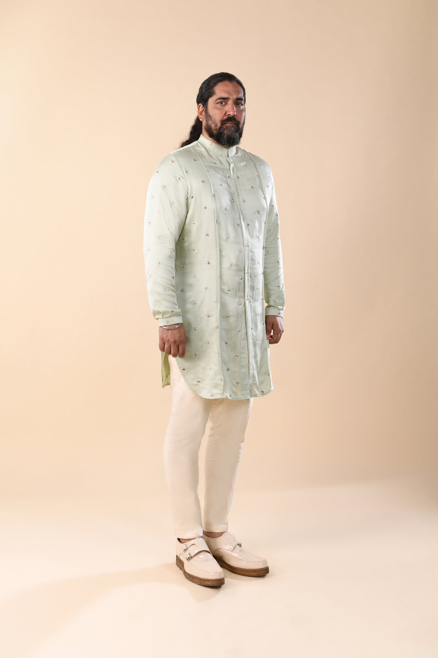 OUTSPREAD MIRROR HIGHLIGHTED PANNELED PASTEL MINT GREEN KURTA  